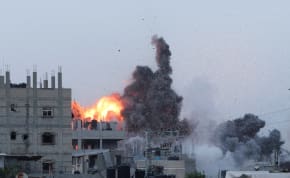  Smoke and flames rise during an Israeli airstrike in central Gaza Strip, June 3, 2024