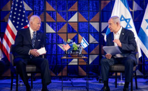  U.S. President Joe Biden, left, meets with Israeli Prime Minister Benjamin Netanyahu, right, to discuss the ongoing conflict between Israel and Hamas, in Tel Aviv, Israel, Wednesday, Oct. 18, 2023. 