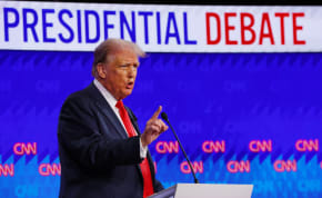  Republican candidate, former U.S. President Donald Trump, speaks as he attends a presidential debate with Democrat candidate, U.S. President Joe Biden, in Atlanta, Georgia, U.S., June 27, 2024.