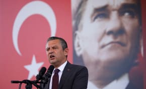  Turkey's main opposition Republican People's Party (CHP) leader Ozgur Ozel, with a poster of modern Turkey's founder Ataturk in the background, speaks during a rally in Istanbul, Turkey, May 18, 2024.
