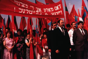 Marching towards the War Memorial, Birobidzhan, USSR 1987. The banner, in Yiddish reads: "The People