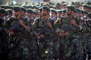 Members of Iran's Revolutionary Guards march during a military parade to commemorate the 1980-88 Ira