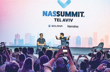  NUSEIR YASSIN (right) and Casey Neistat appear on the Nas Summit stage in Tel Aviv.