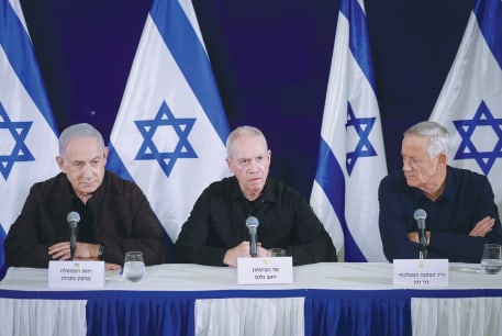  PRIME MINISTER Benjamin Netanyahu, Defense Minister Yoav Gallant, and Minister without Portfolio Benny Gantz hold a news conference in Tel Aviv, in November.