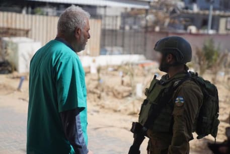  IDF soldier talks with doctor at Nasser Hospital in Khan Yunis, Gaza, February 16, 2024.