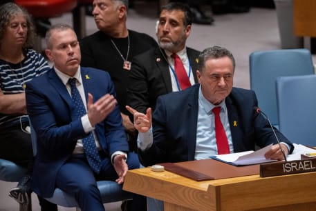  Israel Katz, Foreign Minister to the United Nations points at family members of hostages in the audience during a meeting of the United Nations Security Council on the conflict between Israel and Hamas, at U.N. headquarters in New York, US March 11, 2024.