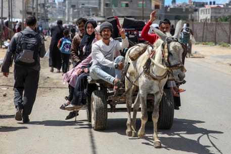  People flee the eastern parts of Rafah after the Israeli military began evacuating Palestinian civilians, May 6, 2024