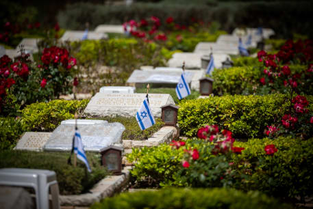  Israeli flags on graves of fallen soldiers in Mount Herzl Military Cemetery in Jerusalem, on May 9, 2024, ahead of Israeli Memorial Day.