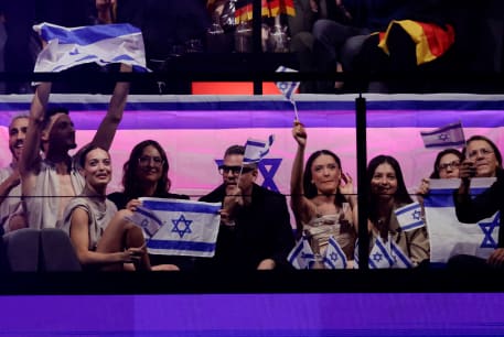  Eden Golan, from Israel, waves a flag during the Grand Final of the 2024 Eurovision Song Contest, in Malmo, Sweden, May 11, 2024.