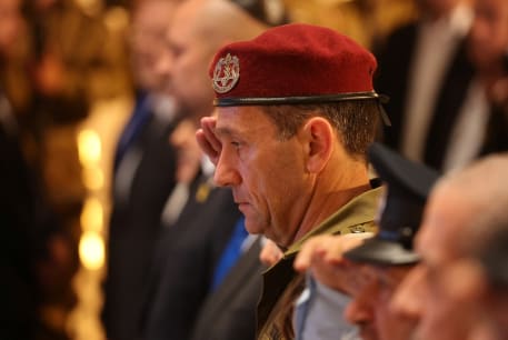 IDF Chief Herzi Halevi salutes during a ceremony marking Memorial Day in Jerusalem on May 13, 2024