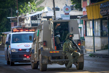  Israeli soldiers seen during a military raid, in the West Bank city of Jenin, December 12, 2023. 