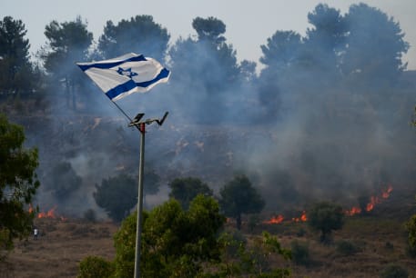 View of a large fire in open areas near Kadita, in the Galilee area, northern Israel, on June 12, 2024