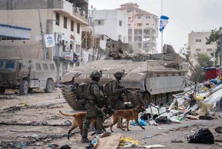  Troops and dogs of the Oketz Canine Unit operate in the Gaza Strip, in an IDF handout image published November 26, 2023.