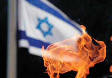 A TORCH burns on Jerusalem’s Mount Herzl, 2017