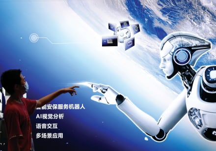 Pointing to an AI robot poster during the 2022 World Robot Conference in Beijing