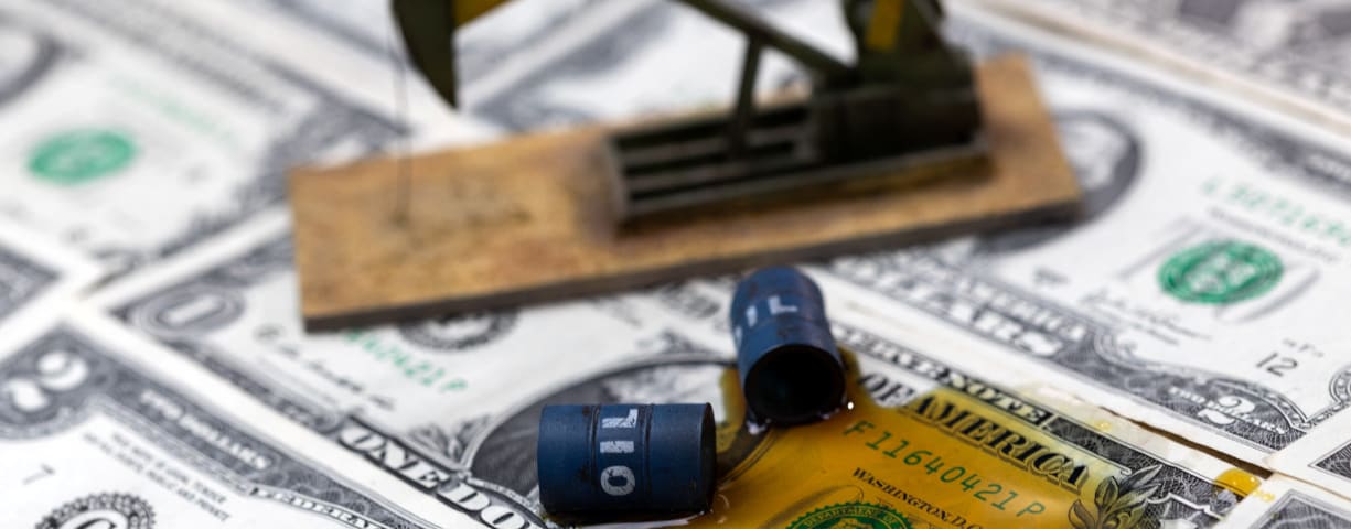  Oil, miniatures of oil barrels, oil pump jack and U.S. dollar banknote are seen in this illustration taken, June 6, 2023.
