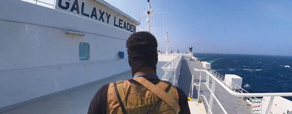  A HOUTHI TERRORIST guards the deck of the ‘Galaxy Leader’ cargo ship in the Red Sea last month.