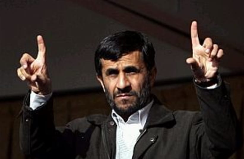 ahmadinejad fingers up (photo credit: AP [file])