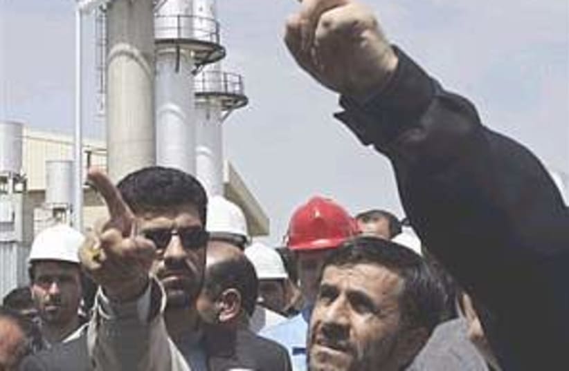 ahmadinejad looks up 298 (photo credit: AP)