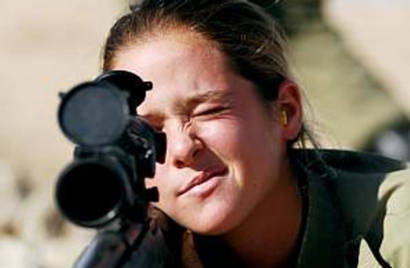 female soldier shoots (photo credit: IDF)