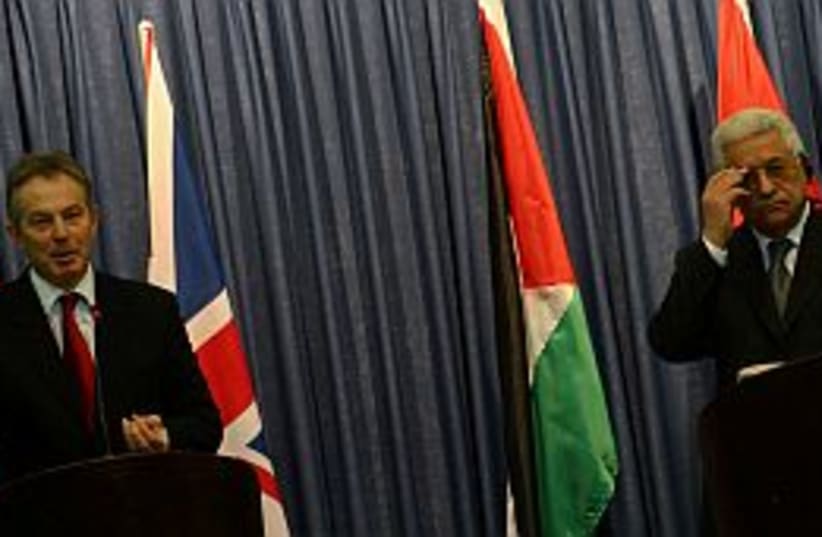 Blair and Abbas (photo credit: AHMAD GHARABLI)