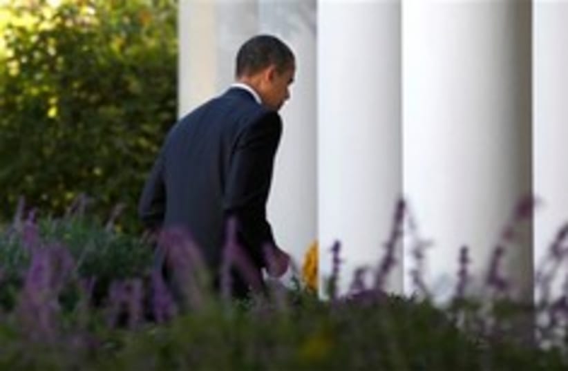 obama walks away 248.88 (photo credit: AP)