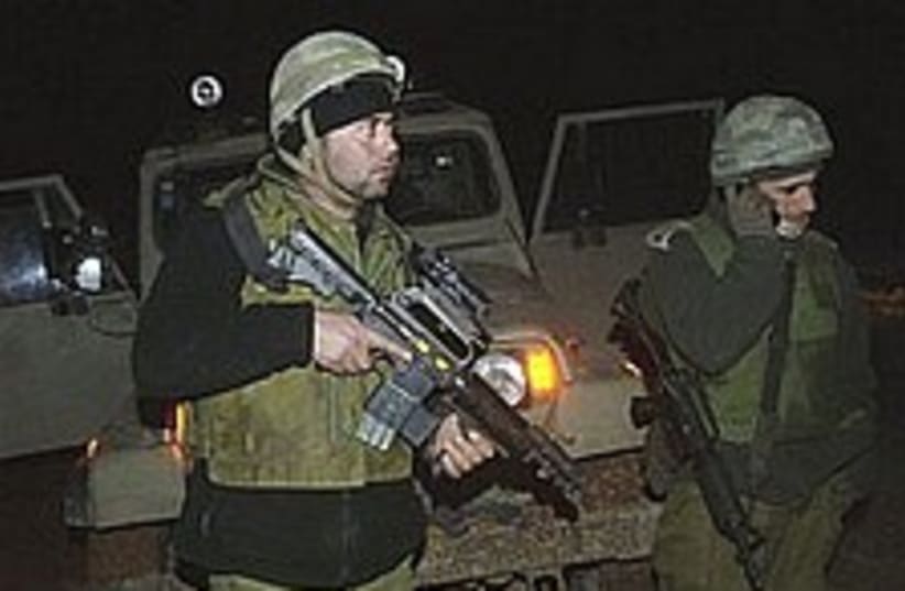IDF troops border 298.88 (photo credit: AP [file])