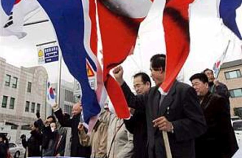 s korea protest 298.88 (photo credit: AP)