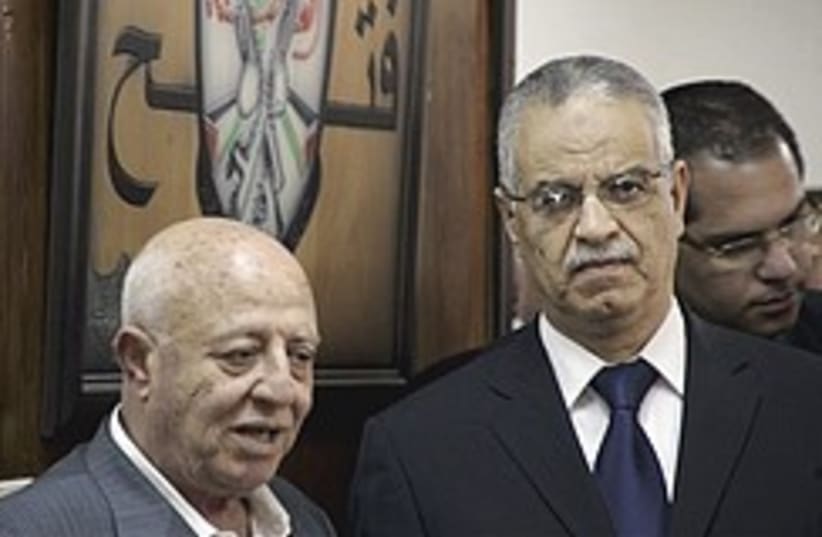 Fatah official Ahmed Qurei with Mohammed Ibrahim,  (photo credit: AP)