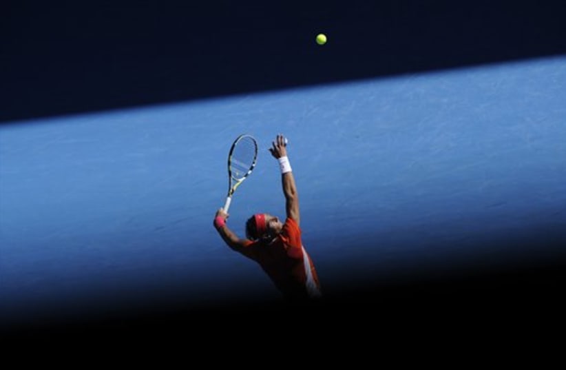 Rafael Nadal at the Australian Open (photo credit: AP Photo/Andrew Brownbill)