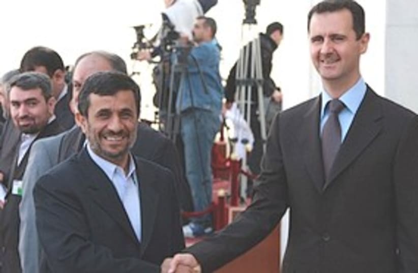 Assad Ahmadinejad 311 (photo credit: Associated Press)
