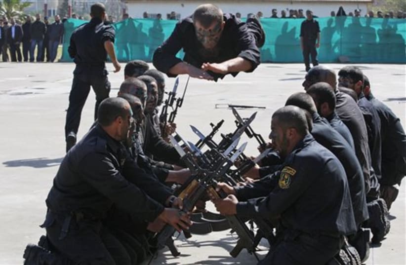 Hamas security forces demonstrate their skills (photo credit: AP)