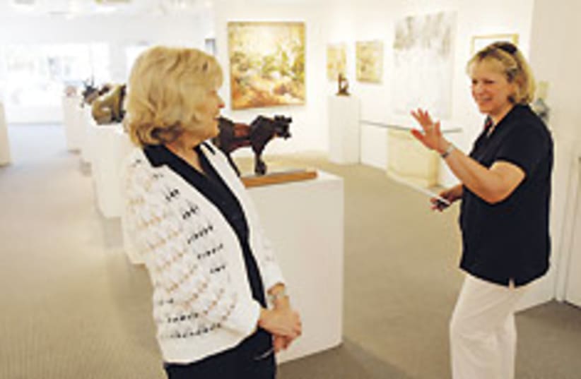 Leslie Levy (left), who has owned an art gallery i (photo credit: AP)