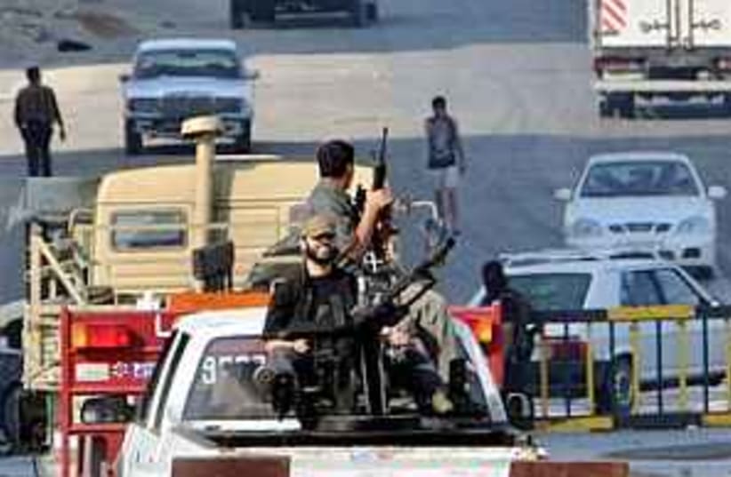 Hamas patrol Gaza 298.88 (photo credit: AP)