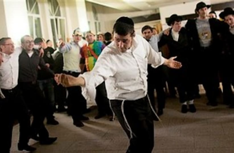 berlin jews dance purim germany 311 ap (photo credit: AP)