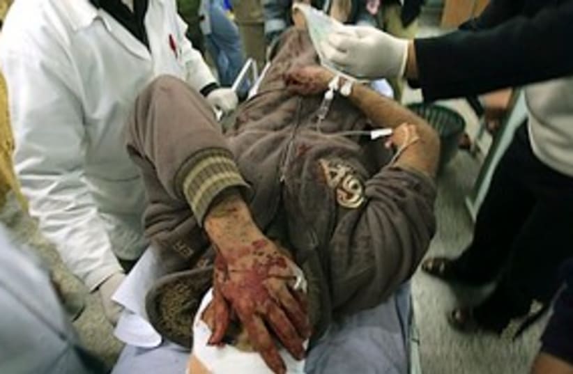 gaza airstrike wounded 311 (photo credit: AP)