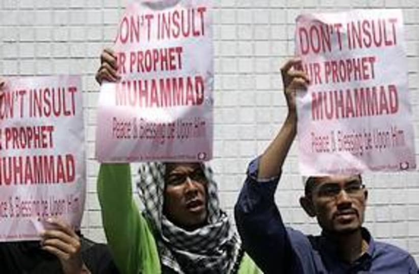 malaysia muhammad cartoon protest 311 (photo credit: AP)
