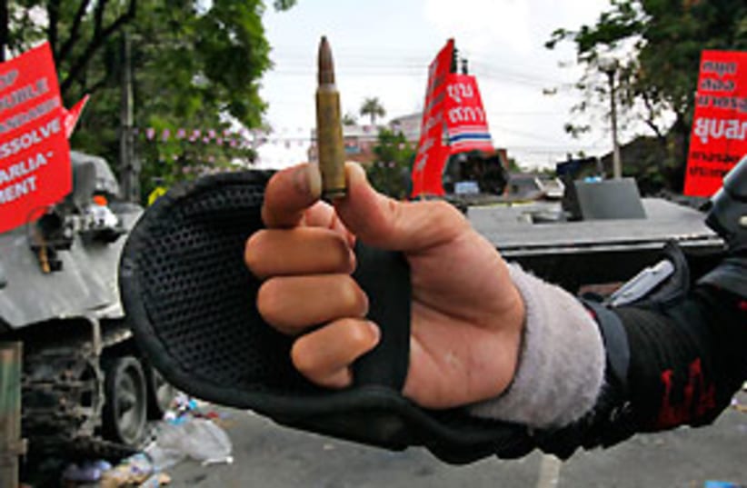 thailand bullet red guard 311 (photo credit: AP)