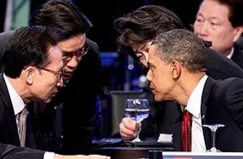 Obama chats at nuke summit 311 (photo credit: ASSOCIATED PRESS)