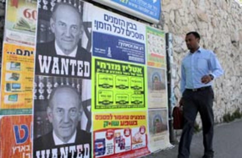 Olmert wanted 311 (photo credit: Ariel Jerozolimski)