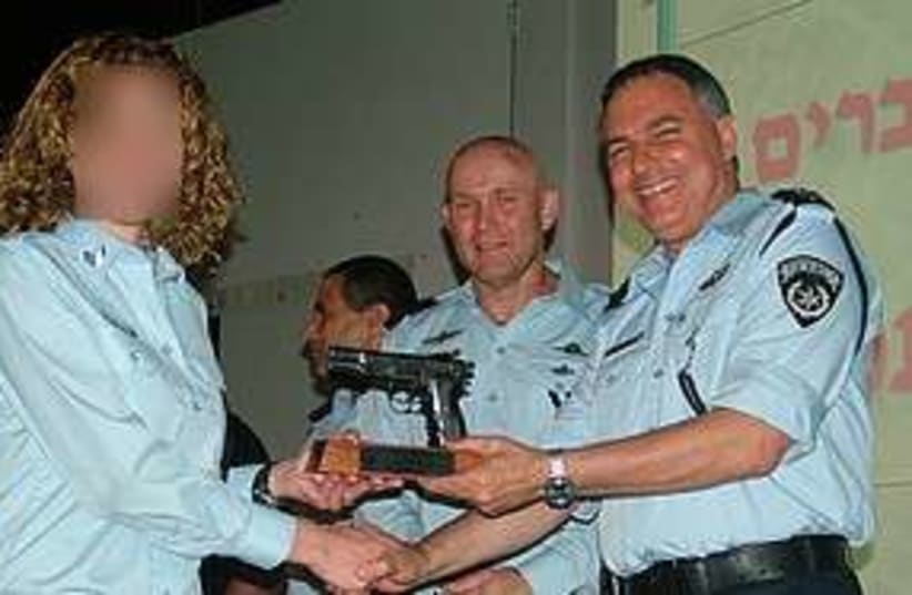 Police agent receives award 311 (photo credit: Israel Police)