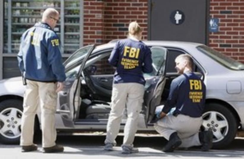 FBI ssearch car (photo credit: ASSOCIATED PRESS)