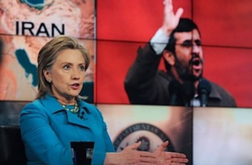 Hillary-Ahmadinejad background (photo credit: ASSOCIATED PRESS)
