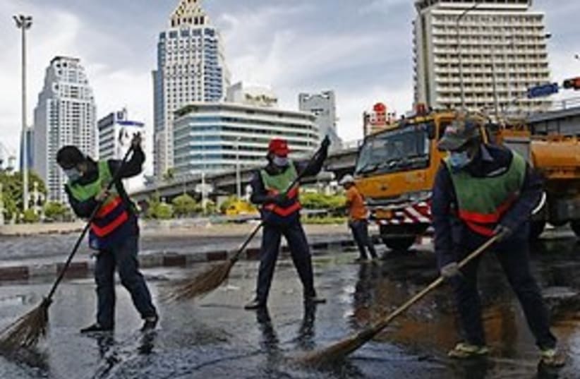 Thai sweepers 311 (photo credit: ASSOCIATED PRESS)