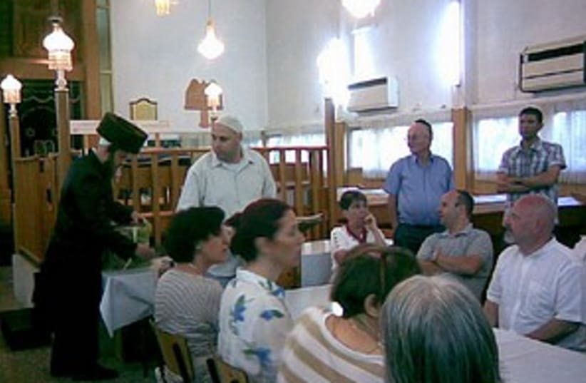 synagogue struggle (photo credit: Courtesy)