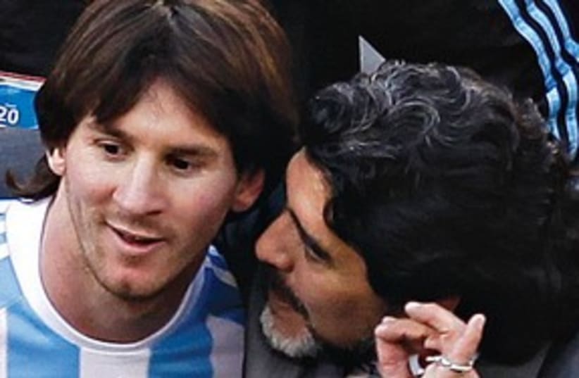 Messi Maradona (photo credit: AP)