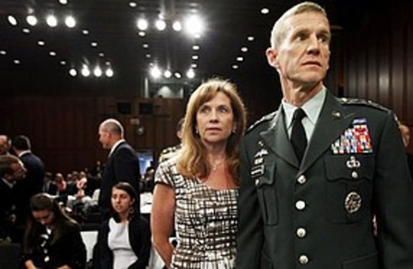 McChrystal + Wife 311 AP (photo credit: Associated Press)