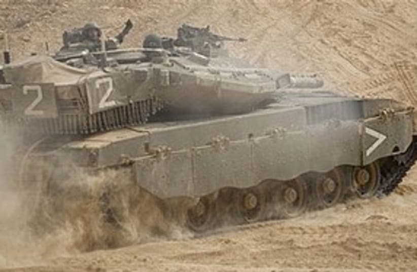 IDF tank lebanon border 311 AP (photo credit: Associated Press)