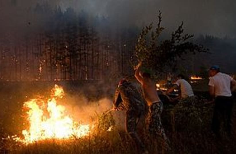 russia fire 311 (photo credit: Associated Press)