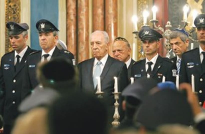 311_Peres at romania crash memorial (photo credit: Associated Press)